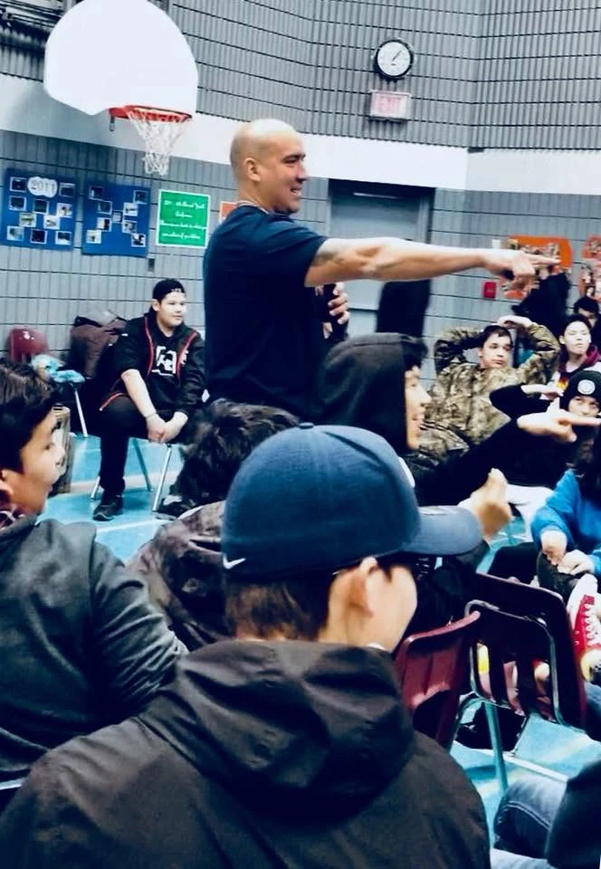 Carlin addressing a group of youth at a Lateral Violence workshop