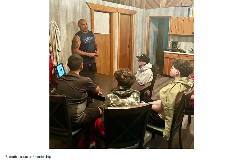 Carlin leading a youth discussion and mentorship session at Kisik Youth Wellness